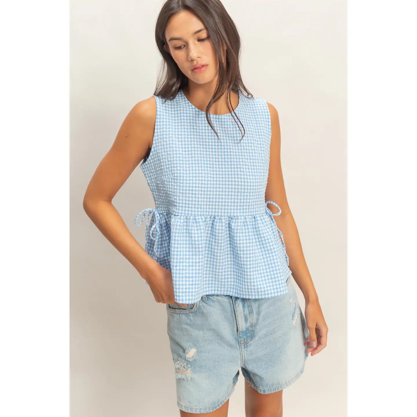 Sleeveless Peplum Top